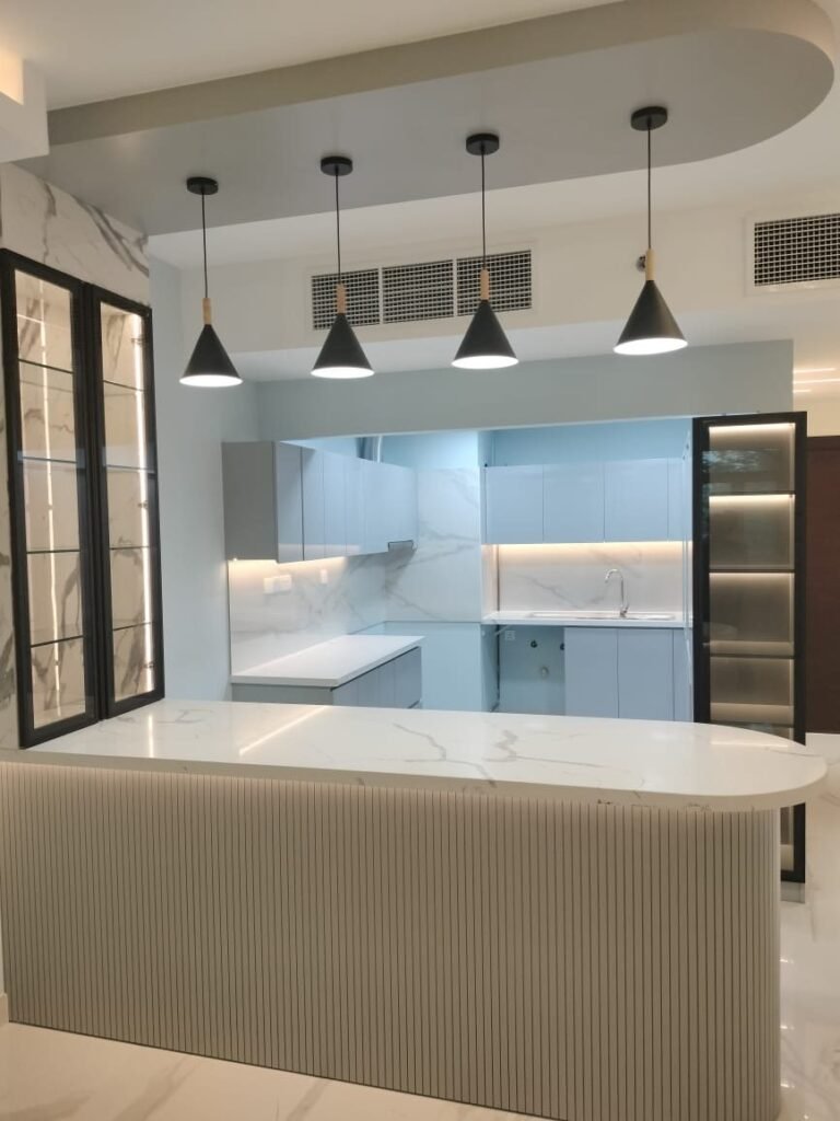 Kitchen with island and pendant lights – Apartment Fit-out – Al Furjan