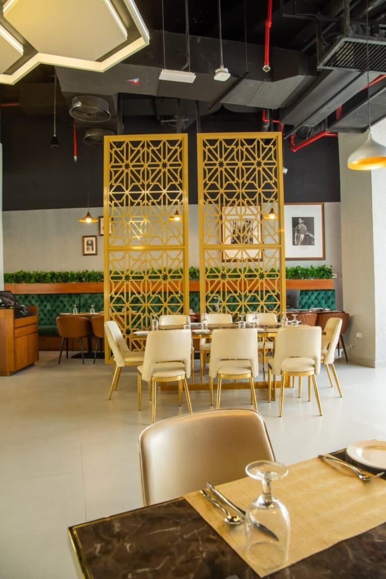 Gold decorative screens and dining area – Pepper Mill Restaurant – Yas Mall, Abu Dhabi